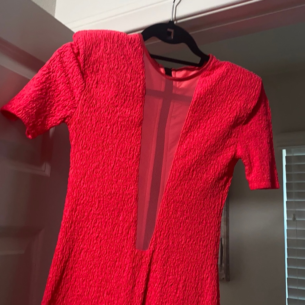 Tight, open V, mini dress